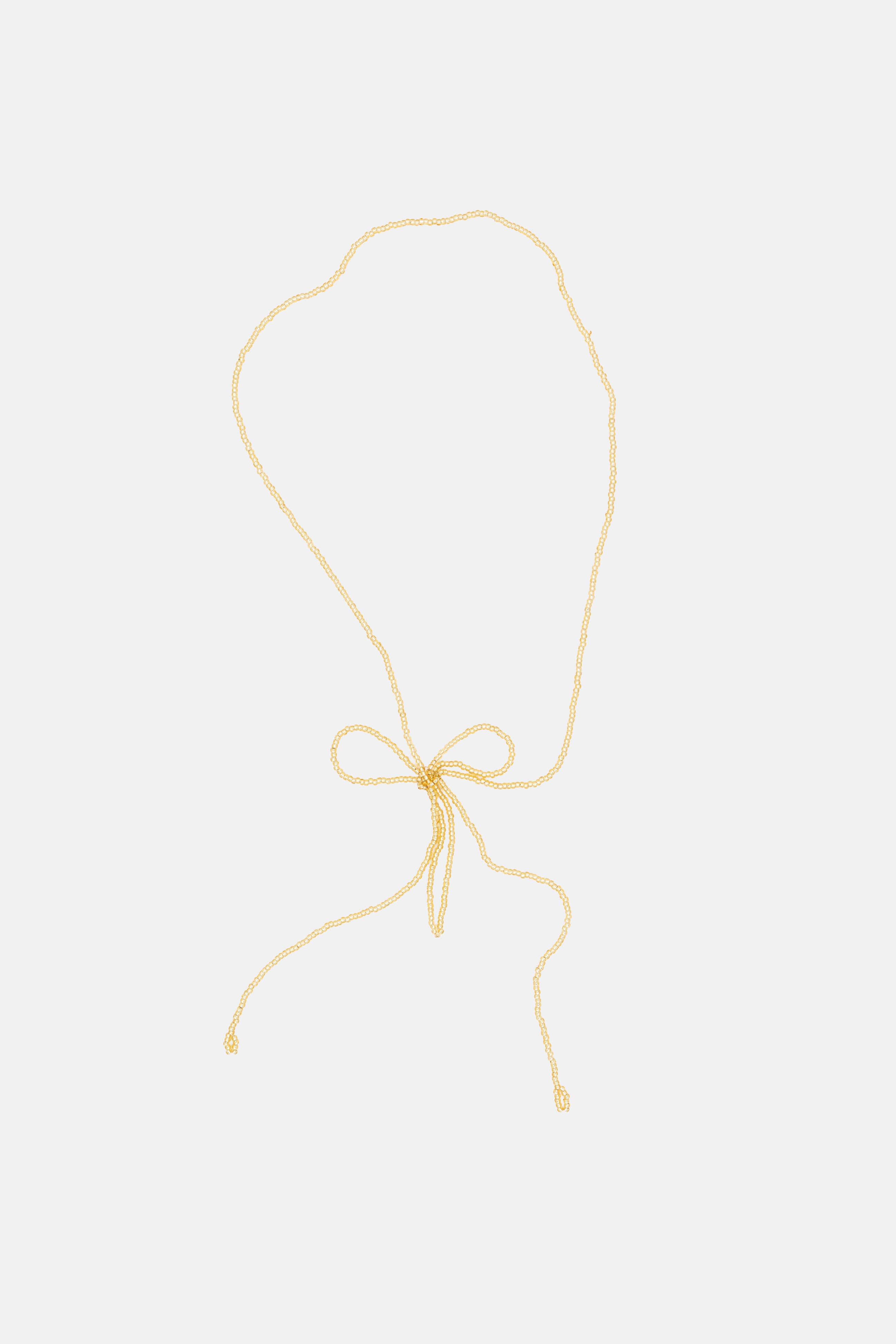 BOW NECKLACE - GOLD